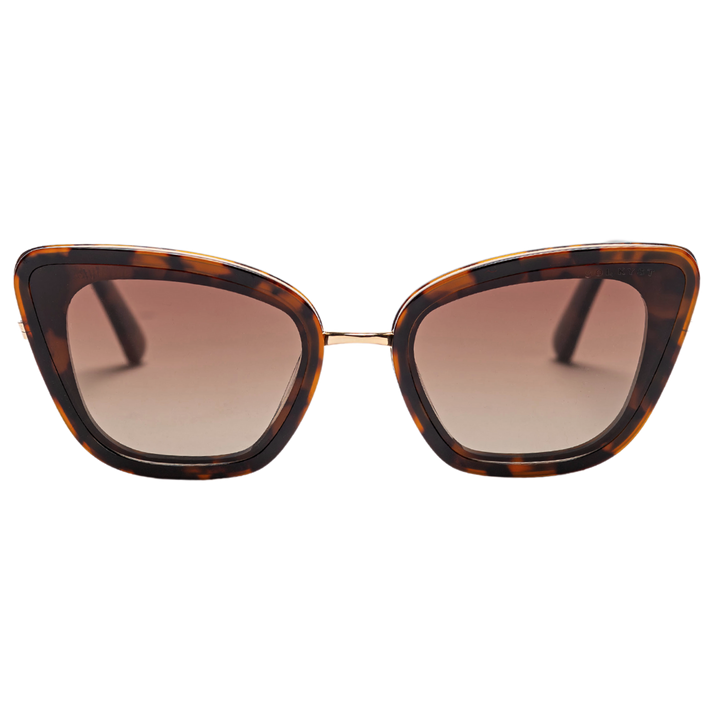 Tortoise cat eye sunglasses with polarized brown lenses and a gold nose bridge, highlighting their unique angular design.