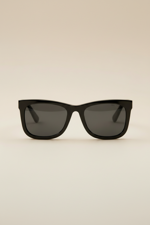 Sol Kyst women's square sunglasses with black frames and dark tinted lenses - front view.