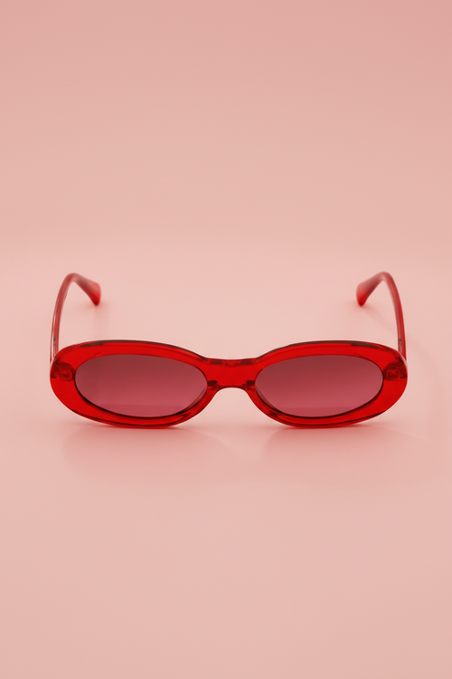 Barbie women's oval sunglasses with red frames and pink-tinted lenses - front view.