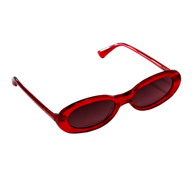 Side angle of Barbie x Sol Kyst oval sunglasses with tinted lenses and sleek red frame design