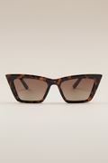 women's trapezoid sunglasses with tortoise frame and orange gradient lenses - front view.