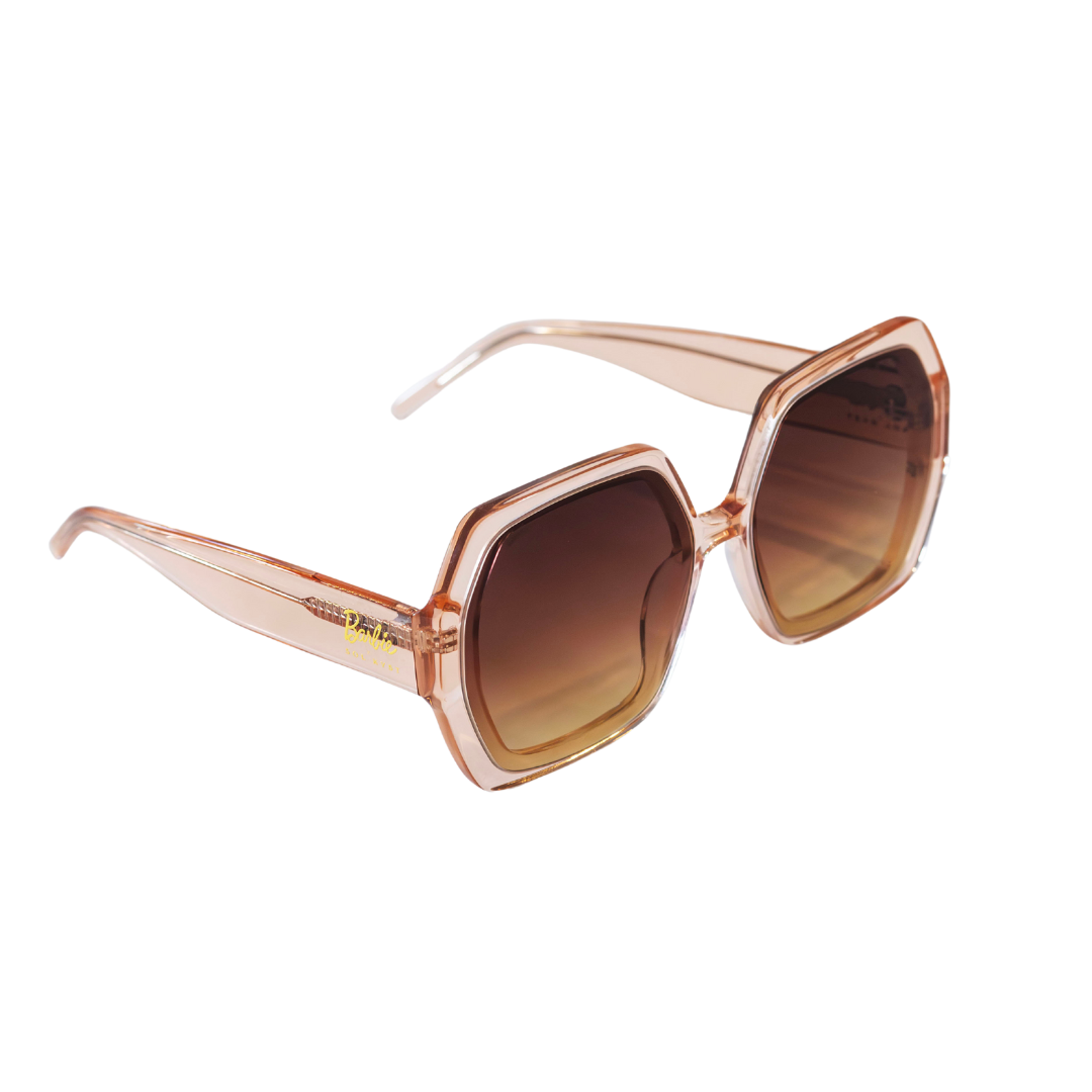 Angled view of Barbie x Sol Kyst brown hexagonal sunglasses with brown tinted lenses.