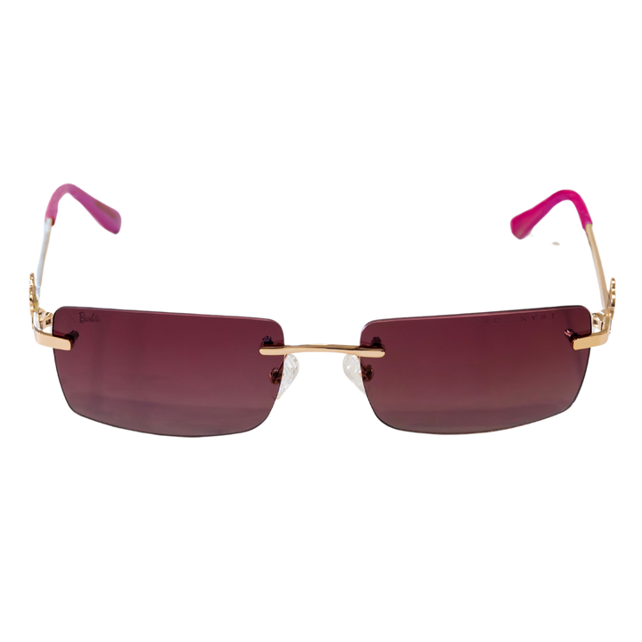 Barbie rimless sunglasses with pink tinted lenses, gold accents, and pink ear tips.