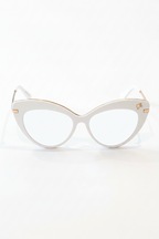 Cat-eye glasses with gold accents on a white background