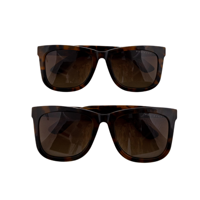 Two stacked Sol Kyst women's square sunglasses with tortoise frames and brown tinted lenses.