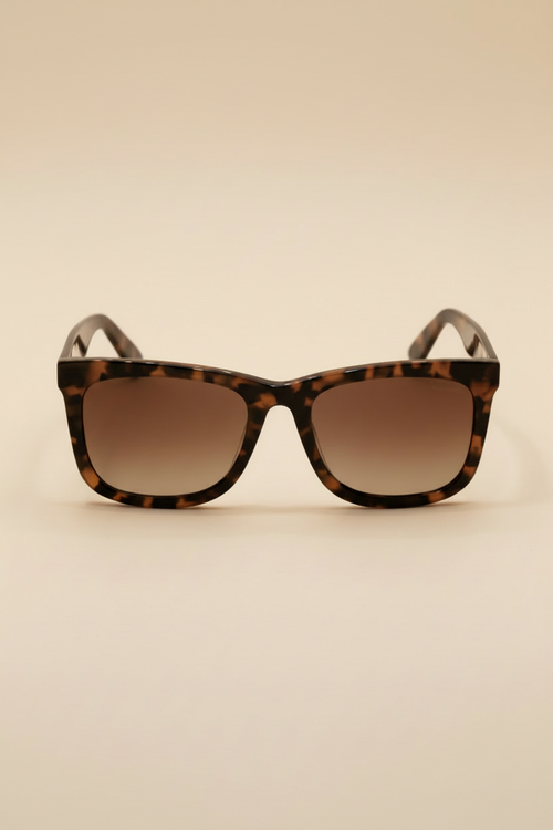Tortoise-patterned square sunglasses with gradient brown-tinted lenses, showcasing a bold and classic frame design.