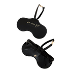 Two views of the black Sol Kyst Kyst Klip, one with 'you’ve been kyst' gold lettering and another holding sunglasses.