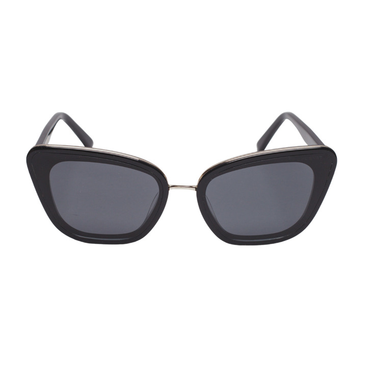 Sol Kyst women's cat eye sunglasses, with black frames and dark tinted lenses - front view.