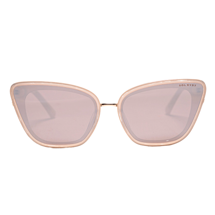 Beige Sol Kyst women's cat eye sunglasses featuring light pink-tinted lenses, shown in a front view.