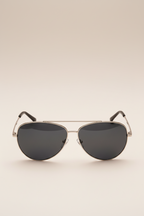 Front view of Sol Kyst women's aviator sunglasses with silver frames and dark polarized lenses - front view.